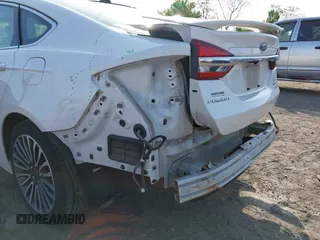 2017 Ford Fusion Hybrid Titanium с VIN 3FA6P0RU7HR148191, выставлен на аукционе IAAI как лот 42167708 с пробегом 72 708 миль миль и . История ставок и продаж доступна на DreamBid. Изображение 6.