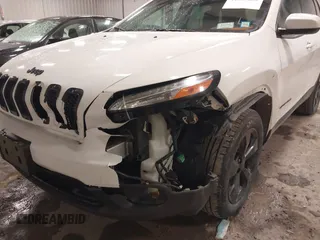 2016 Jeep Cherokee Latitude with VIN 1C4PJMCB0GW226093, listed as a IAAI auction lot 41683652 with 130,168 mi miles and . Bid and sale history available at DreamBid. Image 6.