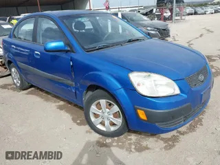 2008 Kia Rio LX with VIN KNADE123486430555, listed as a IAAI auction lot 41875641 with 121,280 mi miles. Bid and sale history available at carsss.com. Image 1.