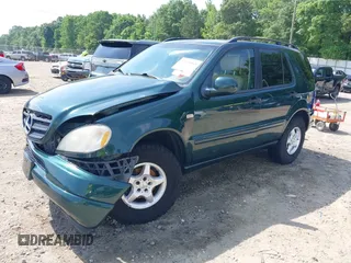 2000 Mercedes-Benz M 320/430/500 z VIN 4JGAB54E9YA180890, wystawiony jako IAAI lot #42151065 z przebiegiem 98 866 mil mil oraz . Historia ofert i sprzedaży dostępna na DreamBid. Obrazek 17.