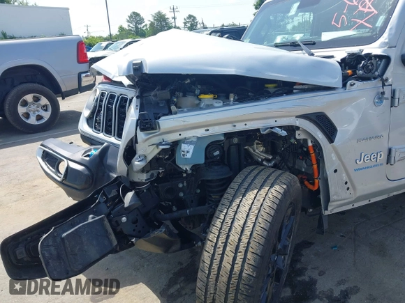 2024 Jeep Wrangler Sahara with VIN 1C4RJXP60RW292136, listed as a IAAI auction lot 42280063 with 26,701 mi miles and . Bid and sale history available at DreamBid. Image 18.