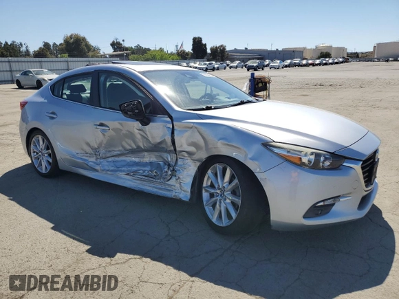 2017 Mazda 3 Grand Touring z VIN 3MZBN1W37HM141705, wystawiony jako Copart lot #56604255 z przebiegiem 62 308 mil mil oraz Szkoda całkowita • Salvage title. Historia ofert i sprzedaży dostępna na DreamBid. Obrazek 4.