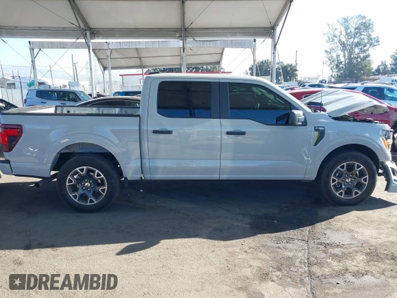 2024 Ford F-150 STX with VIN 1FTEW2KP7RFA29709, listed as a IAAI auction lot 41311395 with 5,883 mi miles and . Bid and sale history available at carsss.com. Image 13.