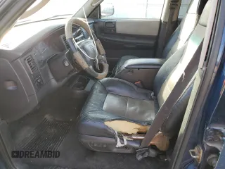 2001 Dodge Durango z VIN 1B4HS28ZX1F583720, wystawiony jako Copart lot #82200974 z przebiegiem 197 799 mil mil oraz Szkoda całkowita • Salvage title. Historia ofert i sprzedaży dostępna na DreamBid. Obrazek 7.