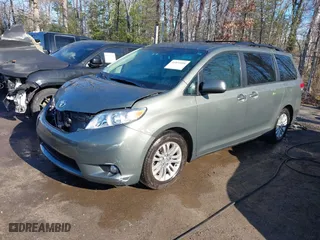 2012 Toyota Sienna XLE AAS with VIN 5TDYK3DC8CS254057, listed as a IAAI auction lot 41853010 with 84,351 mi miles. Bid and sale history available at carsss.com. Image 18.
