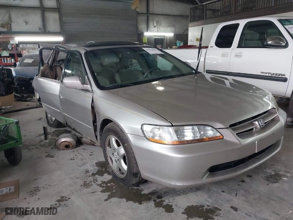 1999 Honda Accord Sdn EX with VIN 1HGCG1651XA026114, listed as a IAAI auction lot 41614955 with 275415 miles. Bid and sale history available at carsss.com. Image 1.
