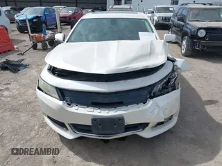 2014 Chevrolet Impala LT with VIN 1G1115SL2EU127217, listed as a IAAI auction lot 41847203 with 95,023 mi miles and . Bid and sale history available at DreamBid. Image 13.