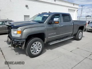 2018 GMC Sierra 2500HD Denali z VIN 1GT12UEY5JF109900, wystawiony jako Copart lot #54791805 z przebiegiem 126 201 mil mil oraz Szkoda całkowita • Salvage title. Historia ofert i sprzedaży dostępna na DreamBid. Obrazek 1.