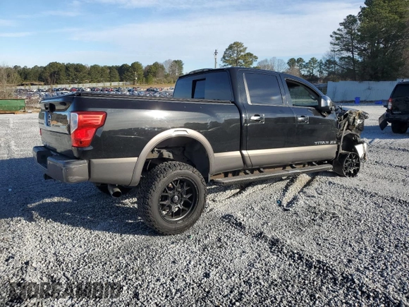 2016 Nissan Titan Platinum Reserve z VIN 1N6BA1F28GN508716, wystawiony jako Copart lot #46797225 z przebiegiem 168 572 mil mil oraz Szkoda całkowita • Salvage title. Historia ofert i sprzedaży dostępna na DreamBid. Obrazek 3.