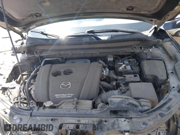 2019 Mazda CX-5 Sport with VIN JM3KFABM7K1509987, listed as a IAAI auction lot 42062804 with 50,898 mi miles and . Bid and sale history available at DreamBid. Image 10.
