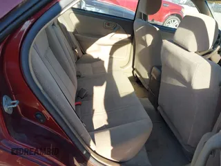 2001 Toyota Camry CE with VIN JT2BG22K710602080, listed as a IAAI auction lot 41858573 with 169,774 mi miles and . Bid and sale history available at carsss.com. Image 8.