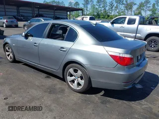 2008 BMW 5 Series 528i with VIN WBANU53598CT07043, listed as a IAAI auction lot 42030992 with 212,833 mi miles and . Bid and sale history available at carsss.com. Image 3.