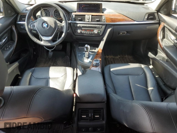 2014 BMW 3 Series 328i xDrive with VIN WBA3B3C58EJ977546, listed as a Copart auction lot 53090185 with 134,823 mi miles and Salvage Title. Bid and sale history available at DreamBid. Image 8.