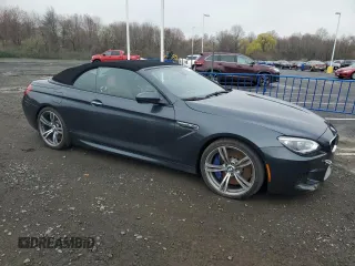 2013 BMW M6 z VIN WBSLZ9C55DDZ77804, wystawiony jako Copart lot #54121185 z przebiegiem 66 286 mil mil oraz Czysty tytuł • Clean title. Historia ofert i sprzedaży dostępna na DreamBid. Obrazek 4.