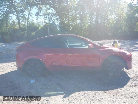 2024 Tesla Model Y z VIN 7SAYGDED2RA325538, wystawiony jako IAAI lot #42180492 z przebiegiem 8 738 mil mil oraz . Historia ofert i sprzedaży dostępna na DreamBid. Obrazek 13.