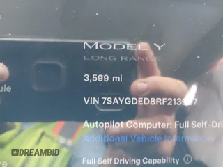 2024 Tesla Model Y with VIN 7SAYGDED8RF213927, listed as a IAAI auction lot 41386687 with 3,599 mi miles and . Bid and sale history available at DreamBid. Image 7.