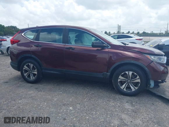 2019 Honda CR-V LX with VIN 2HKRW5H33KH402697, listed as a IAAI auction lot 41942219 with 80,826 mi miles. Bid and sale history available at carsss.com. Image 14.