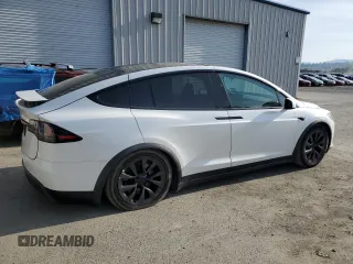 2022 Tesla Model X with VIN 7SAXCDE51NF342652, listed as a Copart auction lot 42756105 with Not Provided miles and Salvage Title. Bid and sale history available at DreamBid. Image 3.