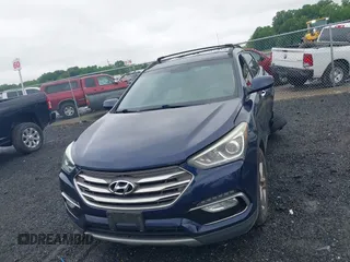2017 Hyundai Santa Fe 2.4L z VIN 5XYZU3LB7HG418300, wystawiony jako IAAI lot #42369329 z przebiegiem 126 326 mil mil oraz . Historia ofert i sprzedaży dostępna na DreamBid. Obrazek 12.