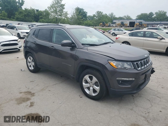 2019 Jeep Compass Latitude with VIN 3C4NJCBB8KT855148, listed as a Copart auction lot 60451975 with 60,033 mi miles and Salvage title. Bid and sale history available at DreamBid. Image 4.