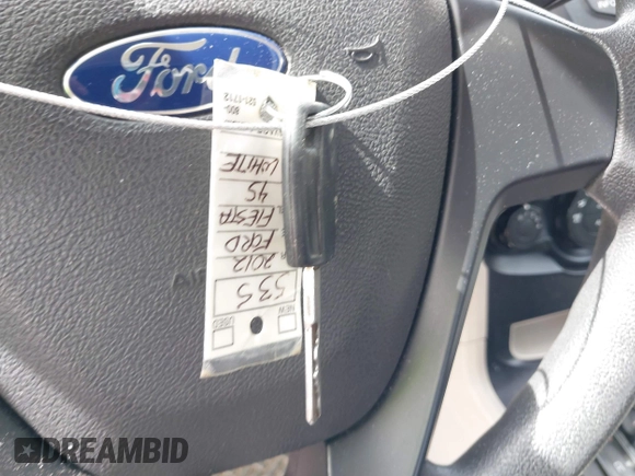 2012 Ford Fiesta S with VIN 3FADP4AJ5CM128060, listed as a IAAI auction lot 41855950 with 139,715 mi miles. Bid and sale history available at carsss.com. Image 11.