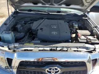 2011 Toyota Tacoma PreRunner z VIN 5TFTU4GN6BX010584, wystawiony jako Copart lot #57284685 z przebiegiem 66 256 mil mil oraz Szkoda całkowita • Salvage title. Historia ofert i sprzedaży dostępna na DreamBid. Obrazek 11.