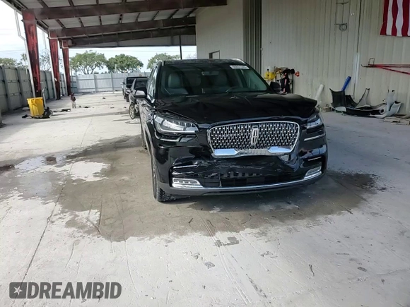 2021 Lincoln Aviator Reserve z VIN 5LM5J7WC5MGL17470, wystawiony jako Copart lot #88851245 z przebiegiem 70 598 mil mil oraz Nie do naprawy • Non repairable. Historia ofert i sprzedaży dostępna na DreamBid. Obrazek 14.