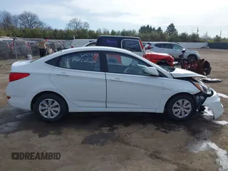 2015 Hyundai Accent GLS with VIN KMHCT4AE5FU805219, listed as a IAAI auction lot 41887922 with 86,909 mi miles. Bid and sale history available at carsss.com. Image 13.