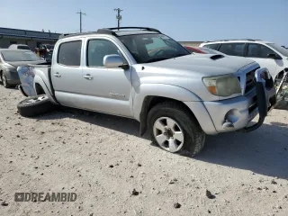 2009 Toyota Tacoma PreRunner with VIN 3TMJU62N69M079303, listed as a Copart auction lot 49885905 with 299,958 mi miles and Salvage title. Bid and sale history available at DreamBid. Image 4.