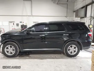 2013 Dodge Durango Crew with VIN 1C4SDJDT9DC670738, listed as a IAAI auction lot 41329419 with 149,520 mi miles. Bid and sale history available at carsss.com. Image 15.