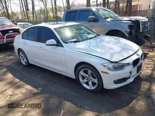 2014 BMW 3 Series 328i xDrive with VIN WBA3B3C55EJ979836, listed as a IAAI auction lot 41886624 with 140,684 mi miles. Bid and sale history available at carsss.com. Image 1.