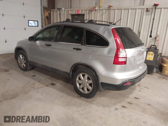 2009 Honda CR-V EX with VIN 5J6RE48539L021091, listed as a IAAI auction lot 41827560 with 106,479 mi miles. Bid and sale history available at carsss.com. Image 3.