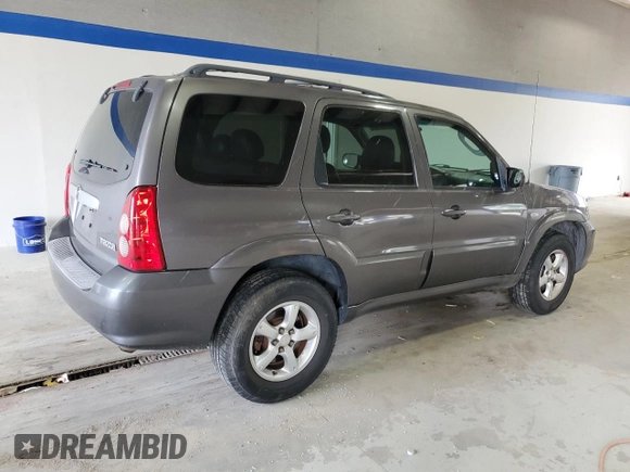 2005 Mazda Tribute S with VIN 4F2CZ96115KM59847, listed as a Copart auction lot 67740144 with 217,053 mi miles and Salvage Title. Bid and sale history available at carsss.com. Image 3.