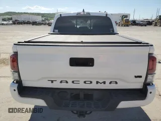 2023 Toyota Tacoma SR z VIN 3TMCZ5AN8PM589655, wystawiony jako Copart lot #56663615 z przebiegiem 43 327 mil mil oraz Szkoda całkowita • Salvage title. Historia ofert i sprzedaży dostępna na DreamBid. Obrazek 6.