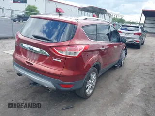 2015 Ford Escape Titanium z VIN 1FMCU0J99FUA92432, wystawiony jako IAAI lot #42257036 z przebiegiem 127 632 mil mil oraz . Historia ofert i sprzedaży dostępna na DreamBid. Obrazek 4.