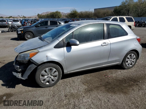 2012 Toyota Yaris L z VIN JTDJTUD36CD501205, wystawiony jako Copart lot #49529145 z przebiegiem 307 992 mil mil oraz Szkoda całkowita • Salvage title. Historia ofert i sprzedaży dostępna na DreamBid. Obrazek 1.