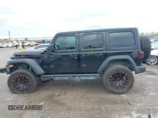 2022 Jeep Wrangler Unlimited Sport S z VIN 1C4HJXDG0NW133801, wystawiony jako IAAI lot #41908846 z przebiegiem 44 743 mil mil oraz . Historia ofert i sprzedaży dostępna na DreamBid. Obrazek 14.