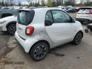 2017 Smart fortwo Pure with VIN WMEFJ5DA0HK176622, listed as a Copart auction lot 51644835 with 59,924 mi miles and Salvage Title. Bid and sale history available at DreamBid. Image 3.