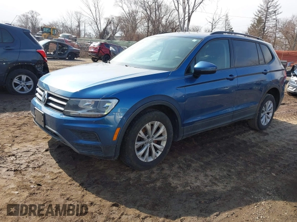 2018 Volkswagen Tiguan S with VIN 3VV1B7AX6JM108786, listed as a IAAI auction lot 41708099 with 162,289 mi miles and . Bid and sale history available at DreamBid. Image 21.
