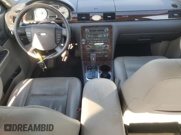 2008 Ford Taurus Limited with VIN 1FAHP25W28G121399, listed as a Copart auction lot 53469565 with 160,764 mi miles and Salvage title. Bid and sale history available at DreamBid. Image 8.