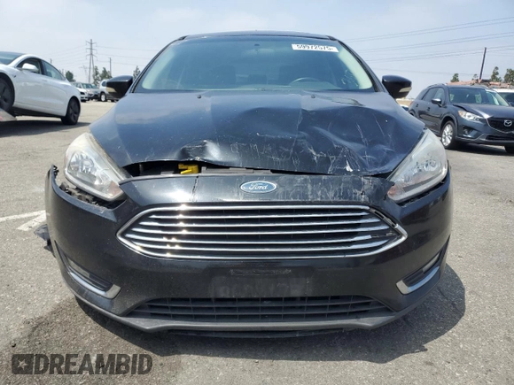 2018 Ford Focus Titanium с VIN 1FADP3N28JL250097, выставлен на аукционе Copart как лот 59972575 с пробегом 127 773 миль миль и Списание • Salvage title. История ставок и продаж доступна на DreamBid. Изображение 5.