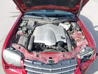 2004 Chrysler Crossfire z VIN 1C3AN69L74X013142, wystawiony jako IAAI lot #41848603 z przebiegiem 126 192 mil mil oraz . Historia ofert i sprzedaży dostępna na DreamBid. Obrazek 10.