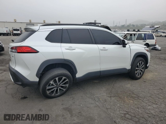 2022 Toyota Corolla Cross XLE with VIN 7MUDAAAG6NV014706, listed as a Copart auction lot 52456065 with 31,041 mi miles and Salvage title. Bid and sale history available at DreamBid. Image 3.
