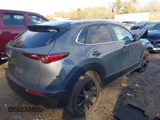 2023 Mazda CX-30 S Carbon Edition with VIN 3MVDMBCM0PM510726, listed as a IAAI auction lot 41150274 with 18,394 mi miles and . Bid and sale history available at DreamBid. Image 4.
