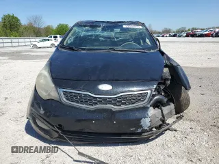 2014 Kia Rio EX z VIN KNADN4A31E6328144, wystawiony jako Copart lot #52235825 z przebiegiem 100 145 mil mil oraz Szkody całkowita. Historia ofert i sprzedaży dostępna na DreamBid. Obrazek 5.
