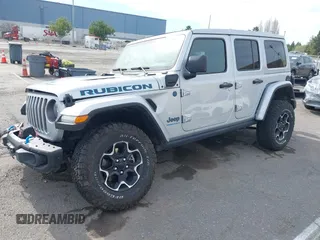 2023 Jeep Wrangler Rubicon with VIN 1C4JJXR69PW581474, listed as a IAAI auction lot 41697016 with 25,775 mi miles and . Bid and sale history available at DreamBid. Image 2.