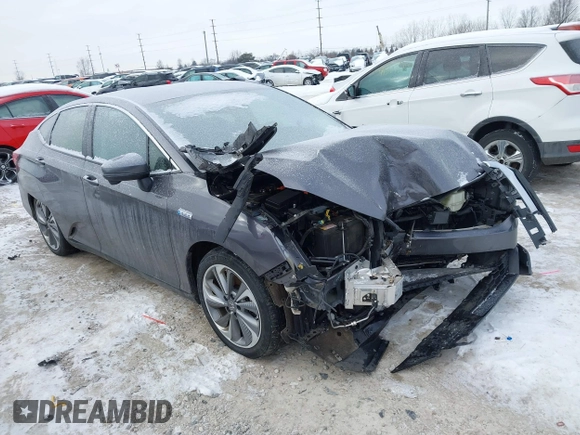 2018 Honda Clarity z VIN JHMZC5F13JC006627, wystawiony jako IAAI lot #41335364 z przebiegiem 58 662 mil mil oraz . Historia ofert i sprzedaży dostępna na DreamBid. Obrazek 1.