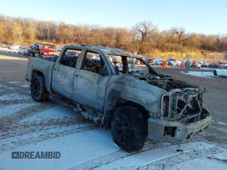 2015 GMC Sierra 1500 SLT with VIN 3GTU2VEJXFG164371, listed as a IAAI auction lot 41317727 with Not Provided miles and . Bid and sale history available at DreamBid. Image 1.