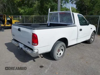 1999 Ford F-150 z VIN 1FTZF1729XKB56992, wystawiony jako IAAI lot #42112335 z przebiegiem 230 061 mil mil oraz . Historia ofert i sprzedaży dostępna na DreamBid. Obrazek 4.