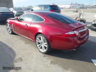 2008 Jaguar XK with VIN SAJWA43C089B22700, listed as a IAAI auction lot 41585734 with 67,946 mi miles. Bid and sale history available at carsss.com. Image 3.